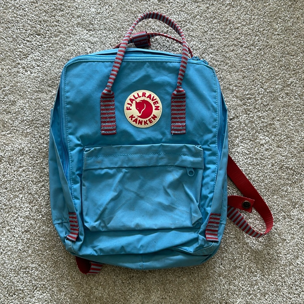 Blue and red Fjallraven Kanken back pack